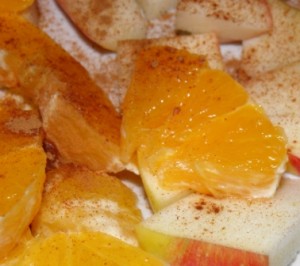 pomarancze i jabłka z cynamonem